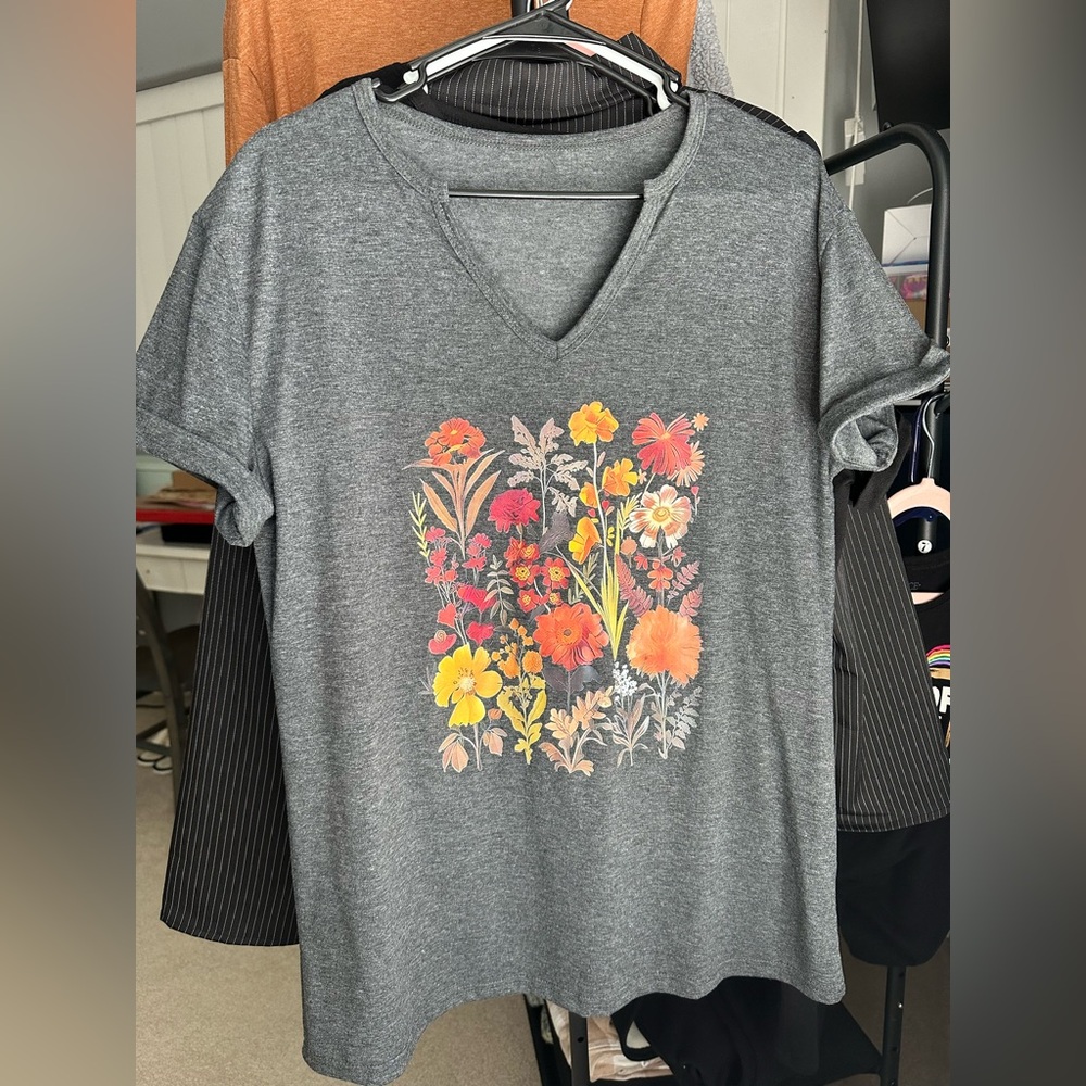 Flower v neck top. Dark greys size large